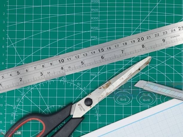 scissors, ruler and cutting mat